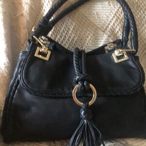 Big Budda Black purse with gold hardware and black tassel